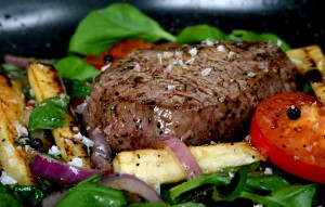 Summer lunch with spring vegetables, cherry tomato & steak