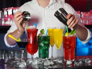 bartender pouring different types of drinks